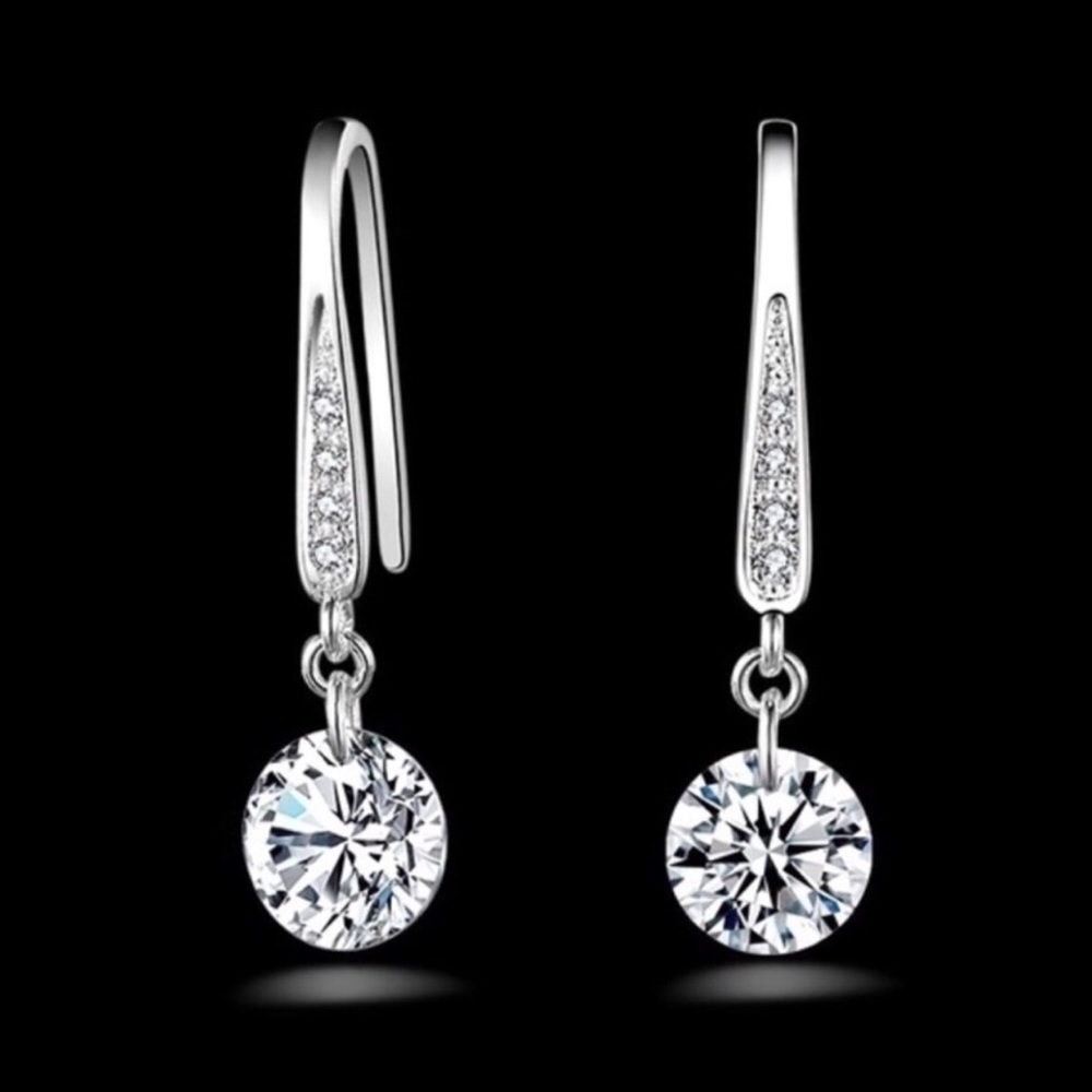 Sterling silver drop earrings with crystals.